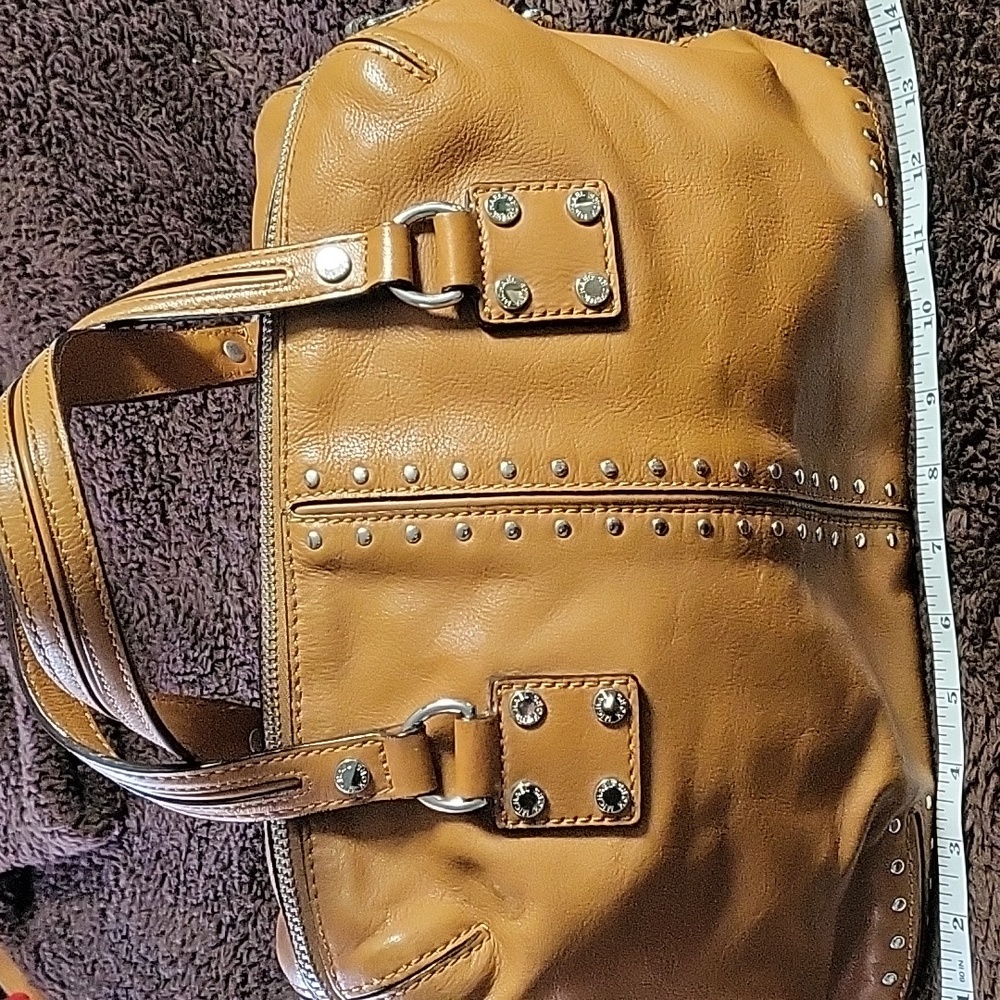 Michael Kors cognac leather silver studded handbag. With shoulder strap